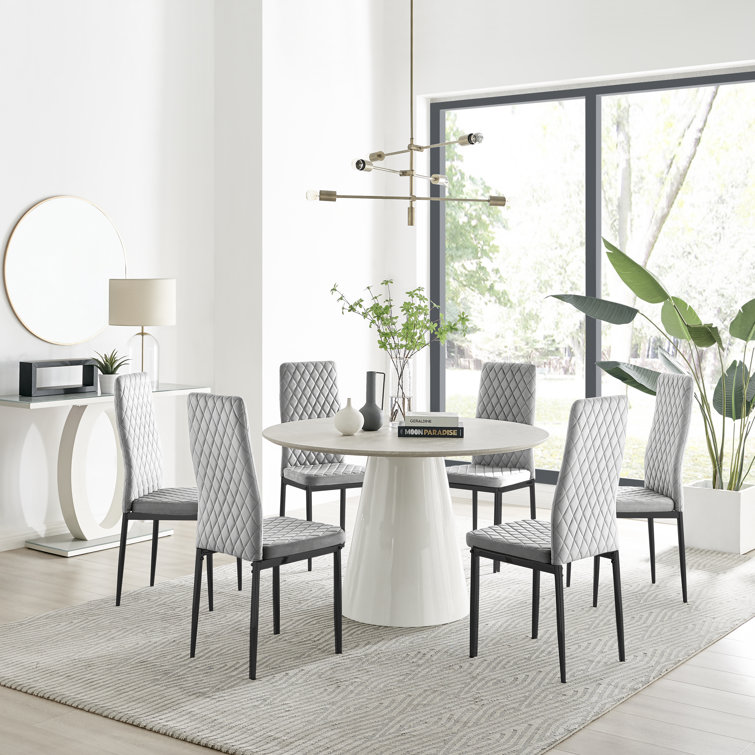 Canora Grey Edzard Statement 6 Person Round Dining Table Set in Luxury Beige Stone Effect Faux Leather Dining Chairs Reviews Wayfair